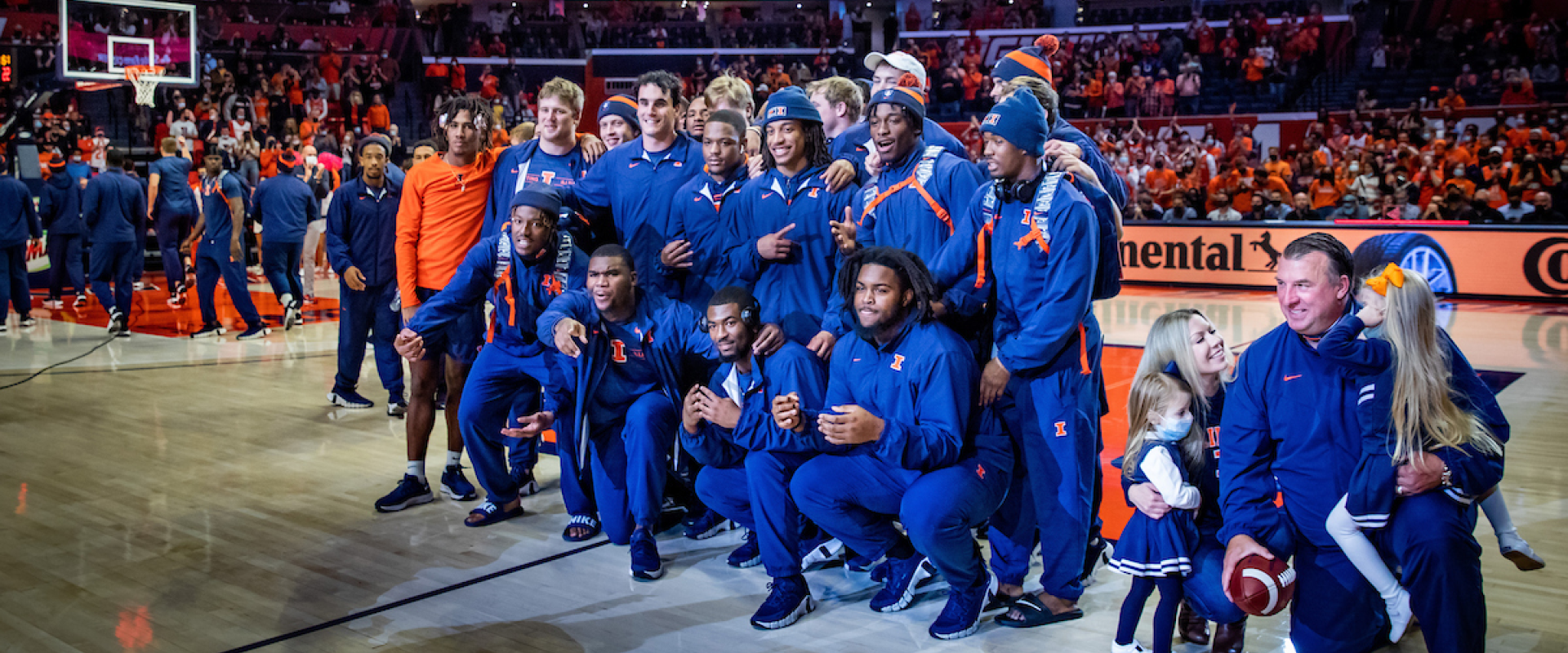 The Fighting Illini football team are honored on the basketball court at State Farm Center.